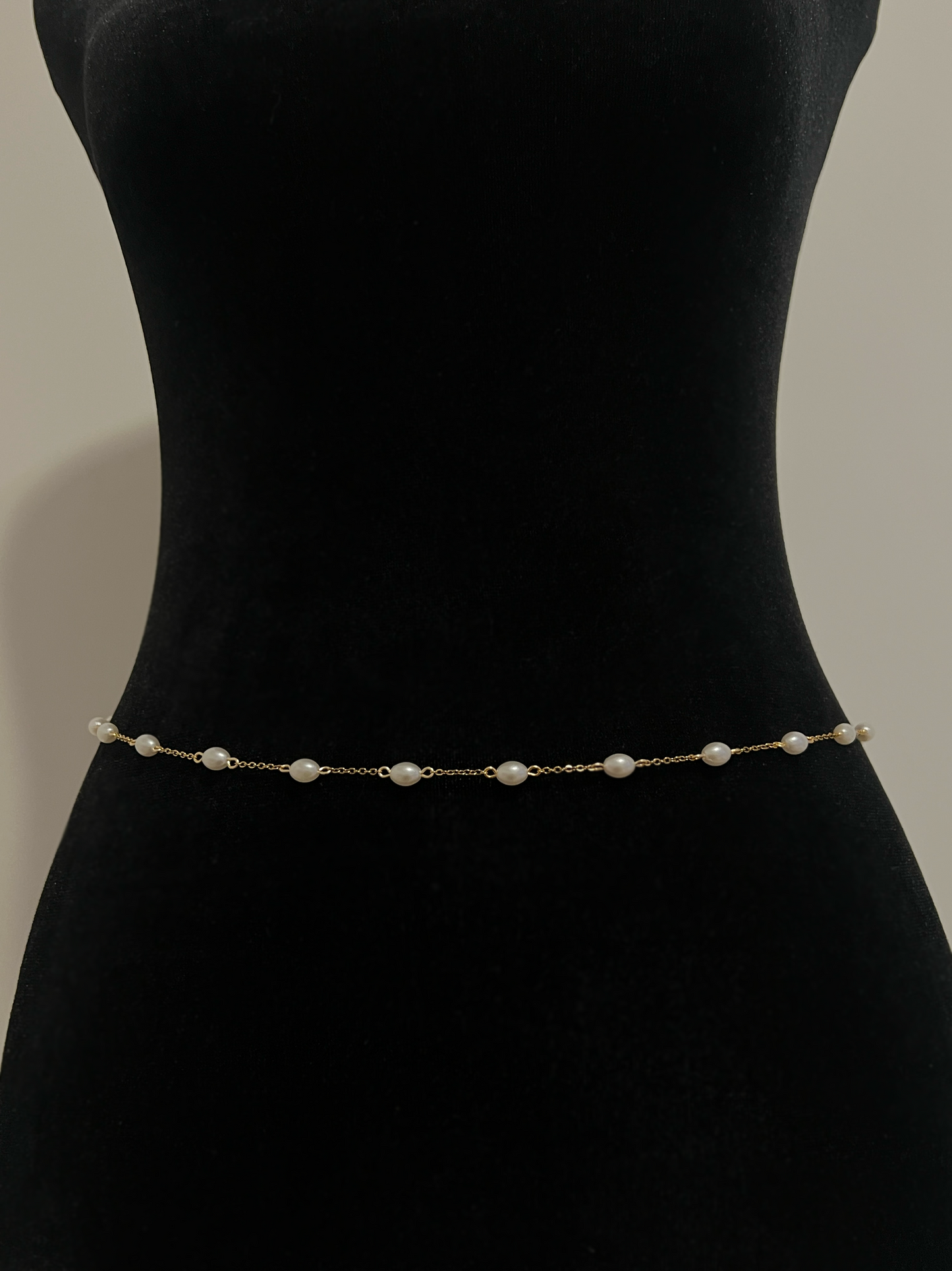 Delicate pearl waist chain with gold links, elegant handmade accessory for women