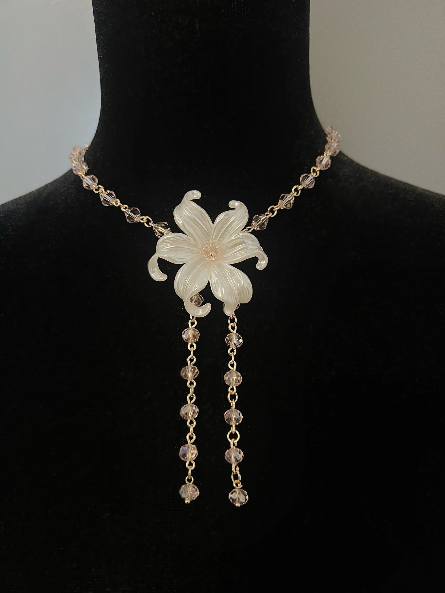 Elegant flower pendant necklace with crystal beads and gold chain, perfect for handmade jewelry lovers.