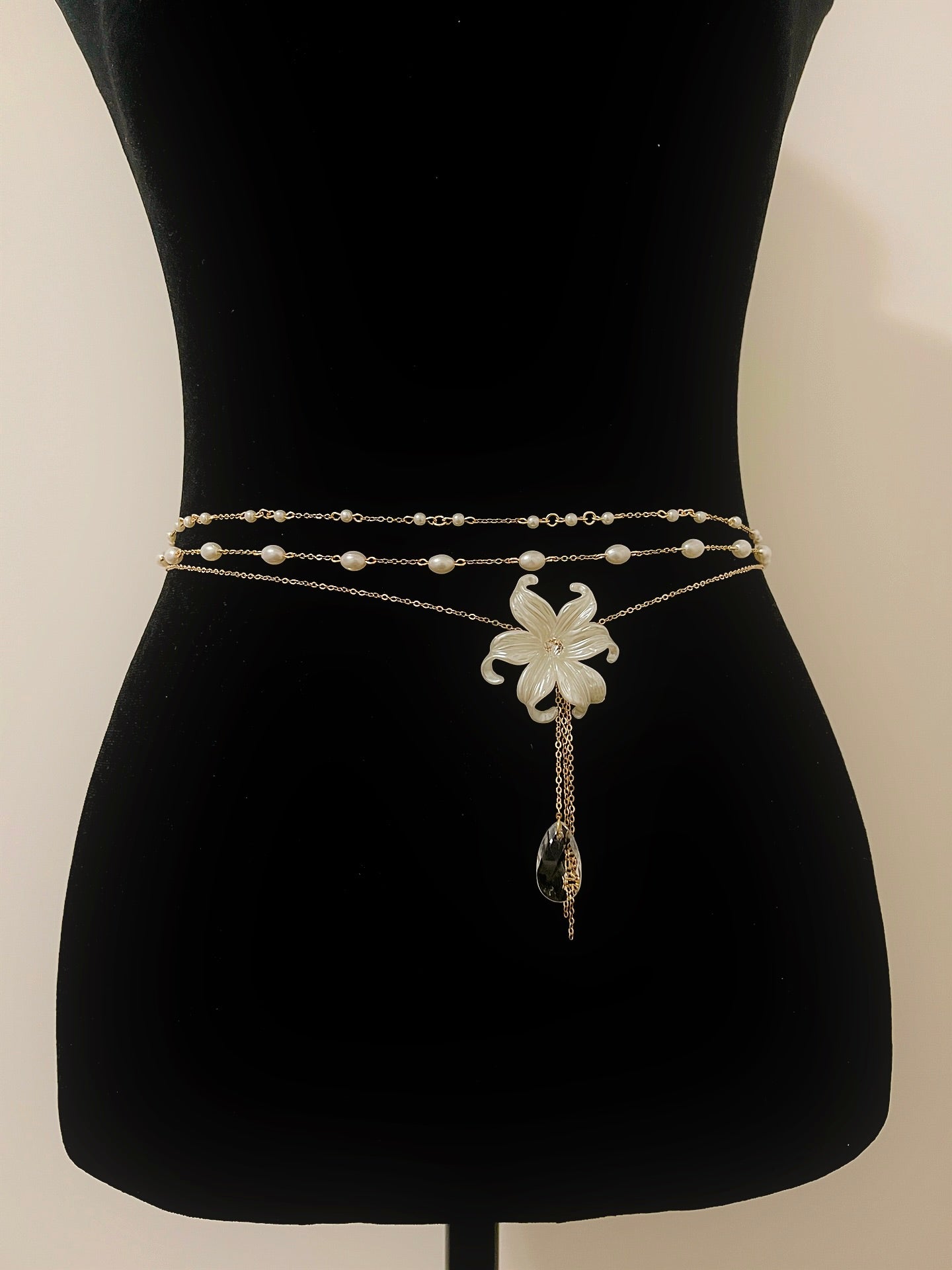 Elegant pearl waist chain with floral pendant and crystal drop, handmade boho accessory for women